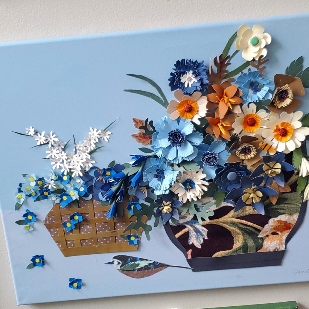 Collage art. Hand cut paper on canvas